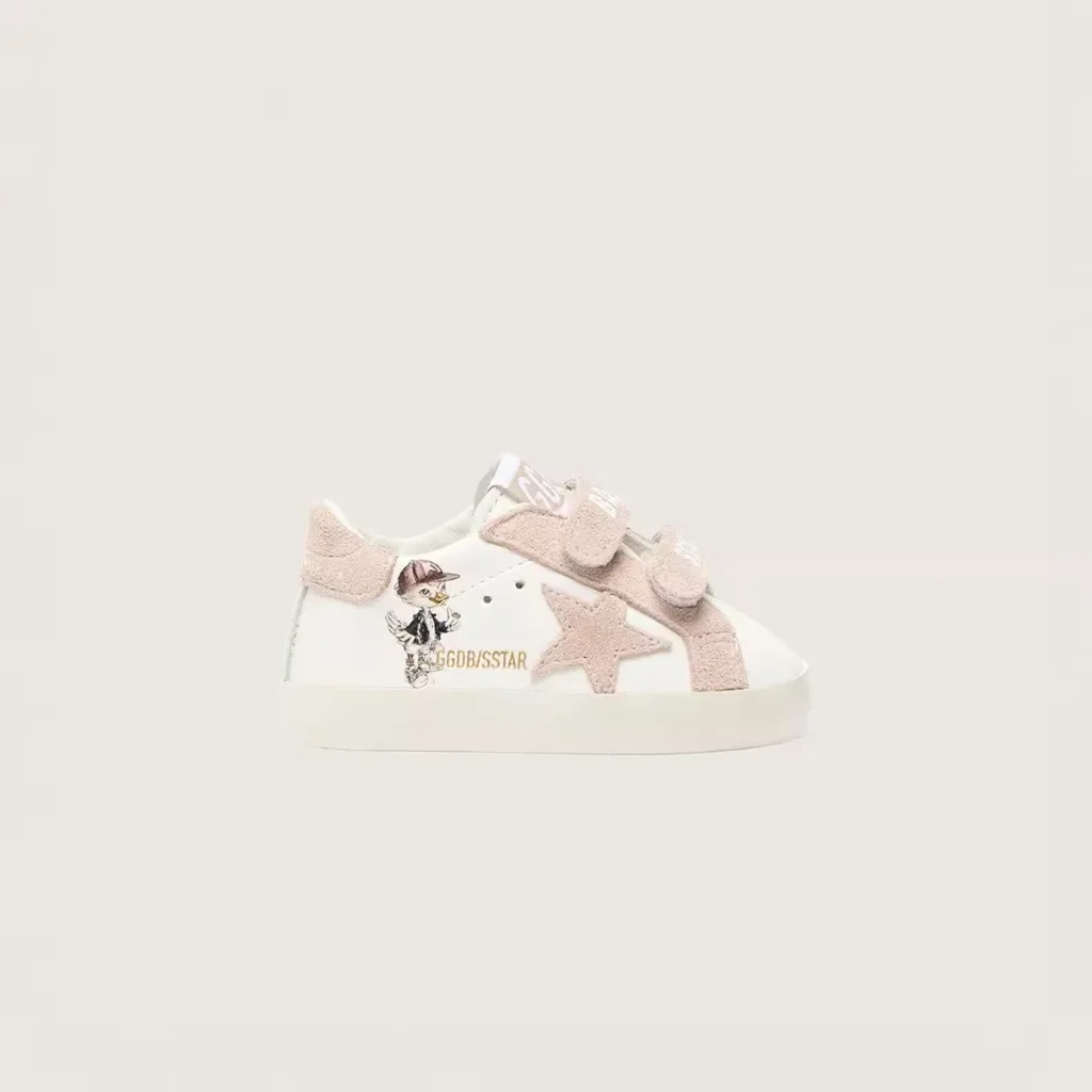 Children's sneakers arranged in a gift box