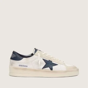 Low-top sneaker in a styled product setting